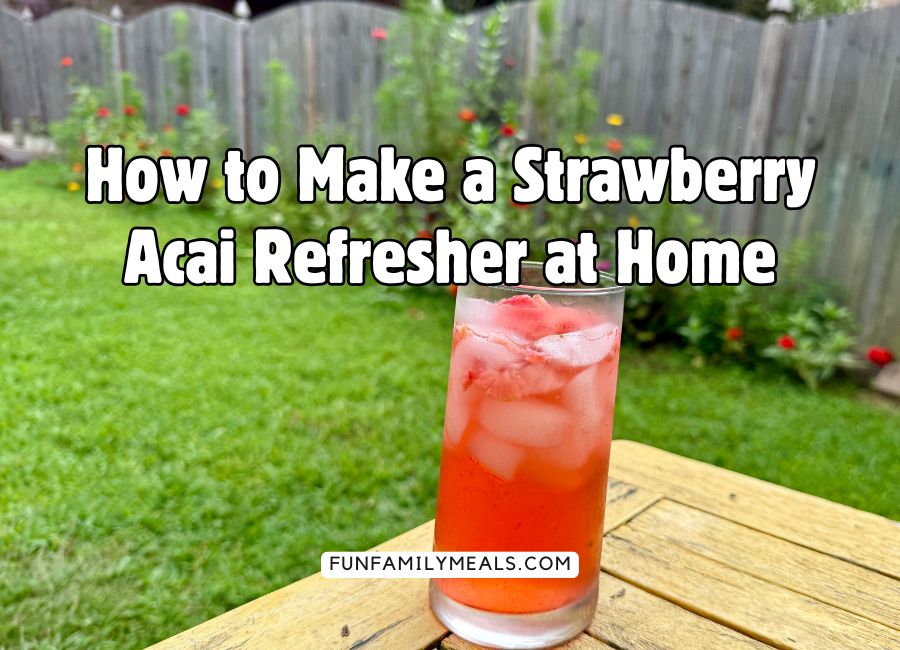 image shows a homemade strawberry acai refresher in a backyard