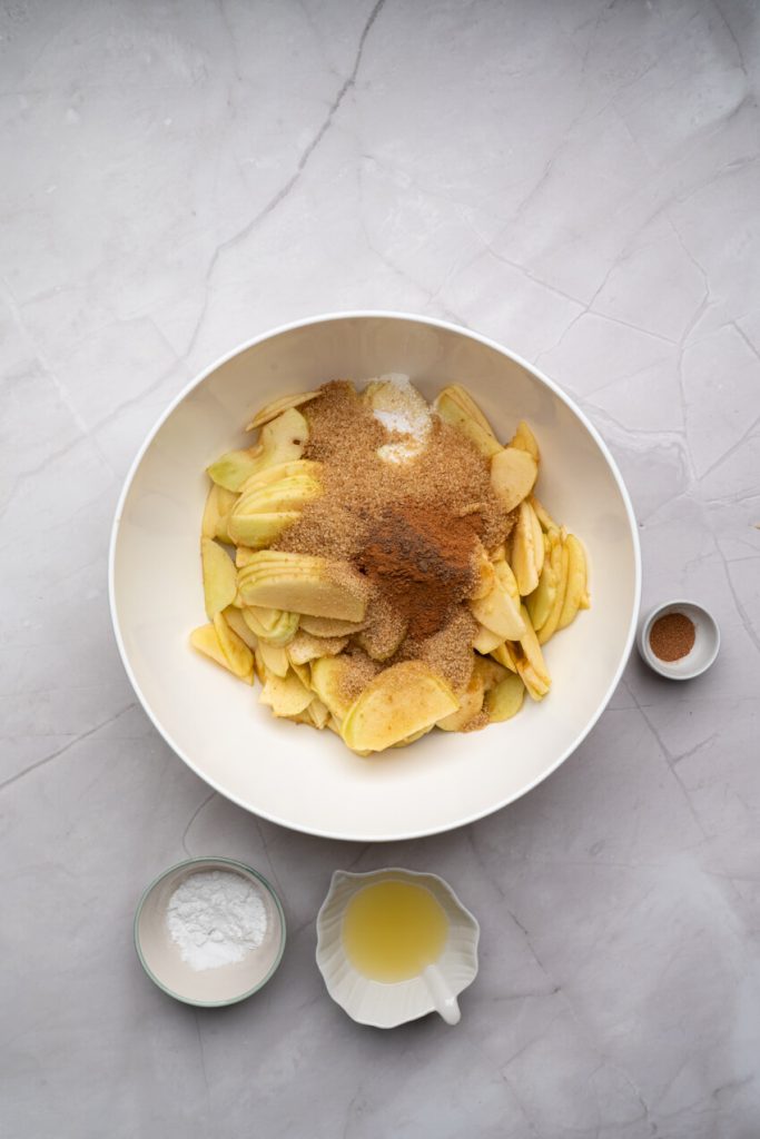 apples with filling ingredients in a bowl