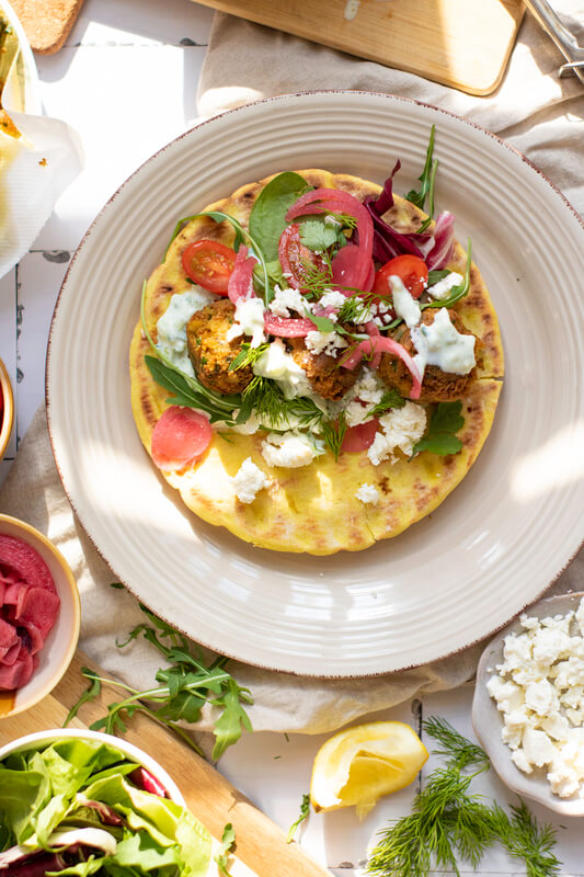 image shows the falafel wraps being assembled