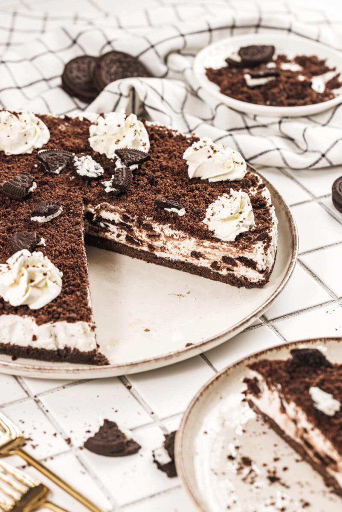 sliced Oreo cheesecake on plate